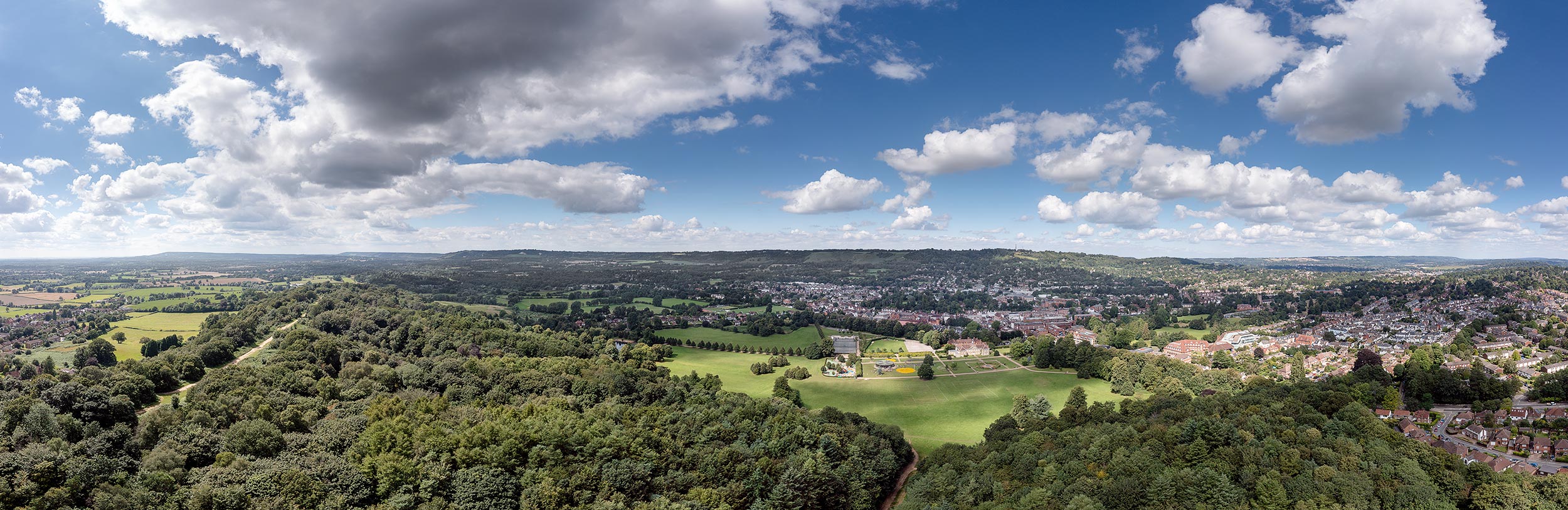 Panoramic drone view of Reigate Town and Priory Park